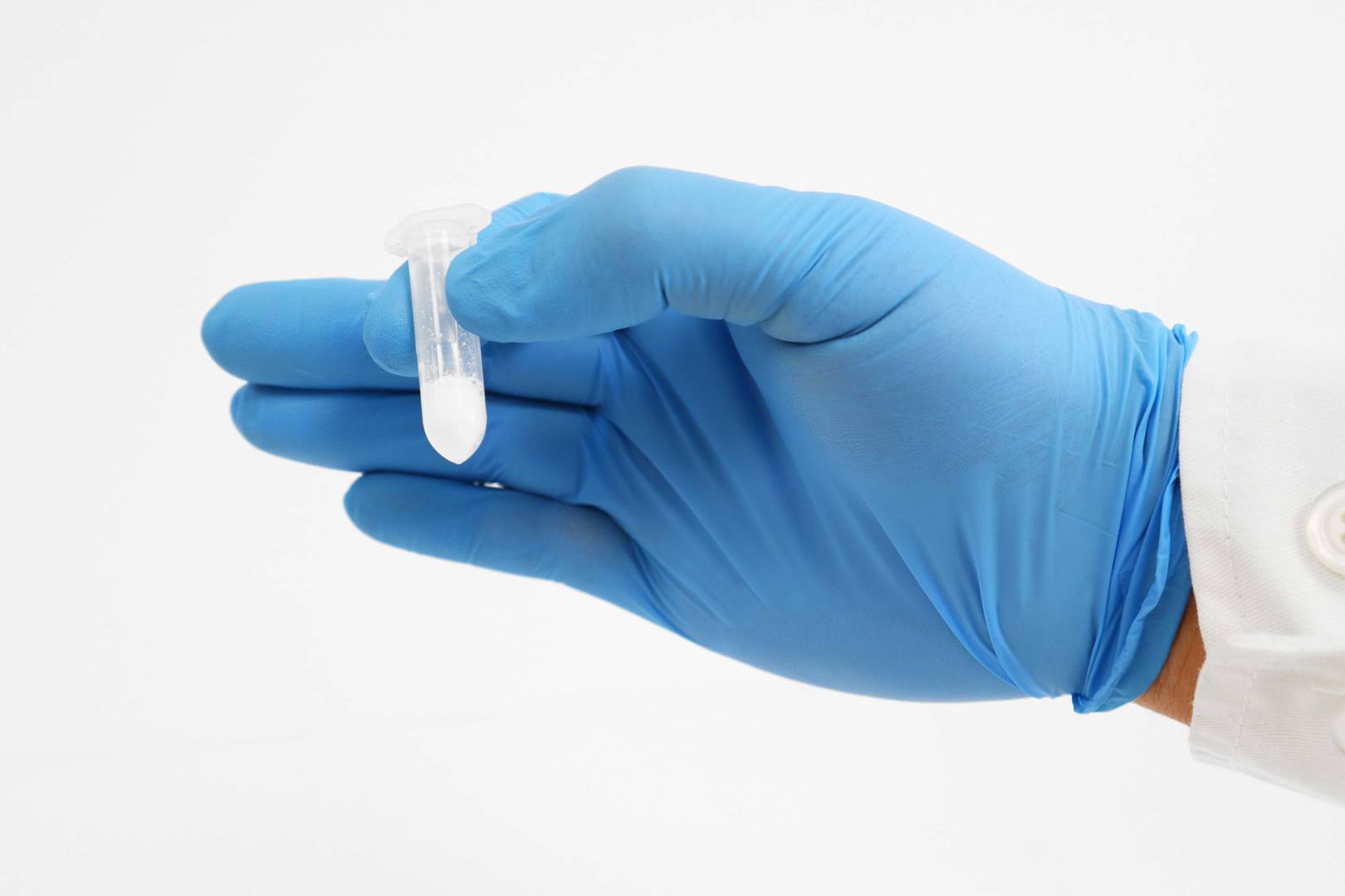 Hand holding the Extraction Tube