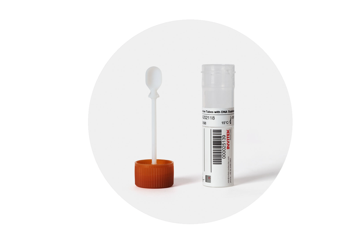 A stool collection kit consisting of a small white sampling spoon attached to an orange screw-cap lid, placed next to a transparent sample tube with a barcode and printed label.