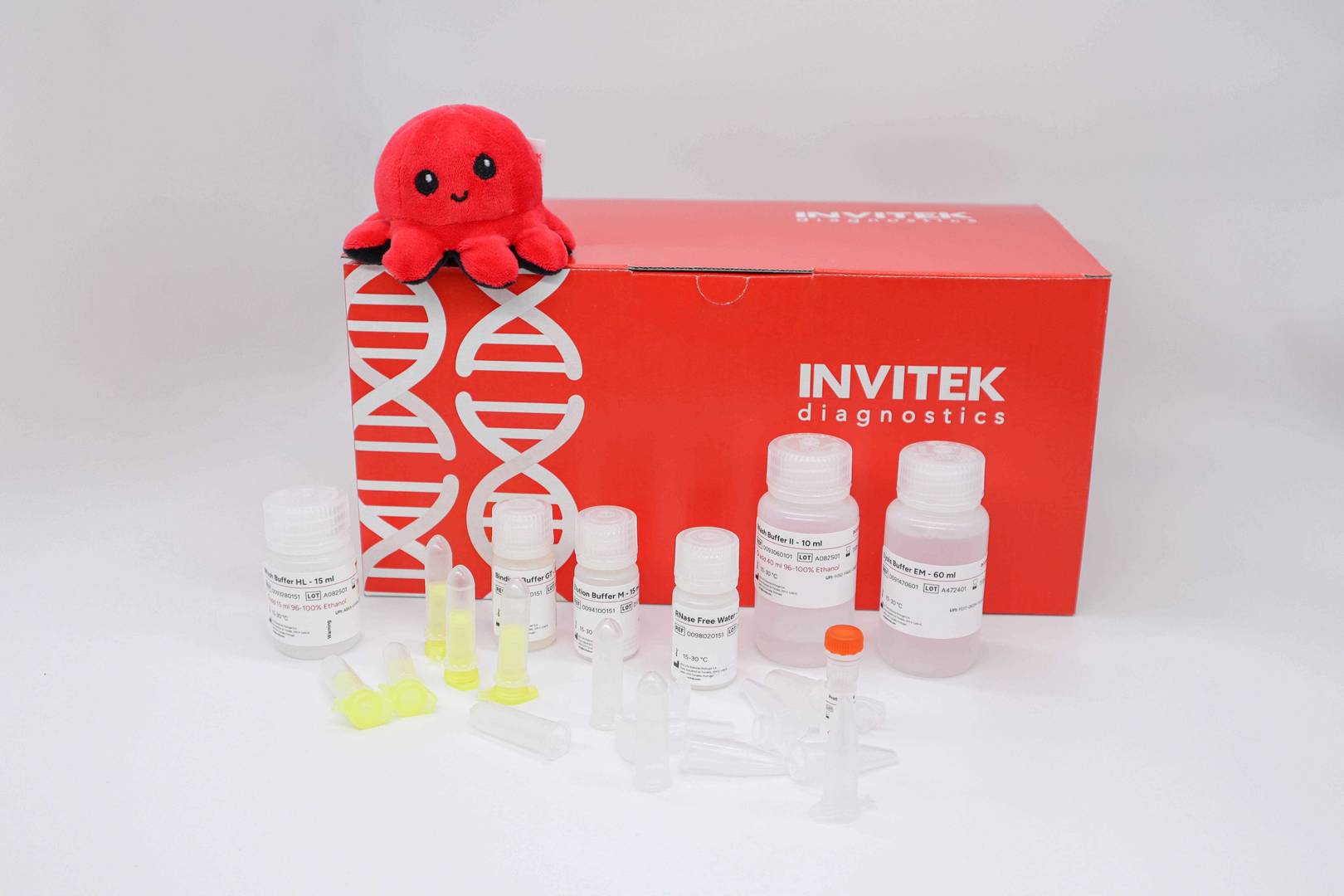 Red Invitek Diagnostics InviSorb Spin Food Kit box with reagent bottles, an orange-capped vial and tubes in front.