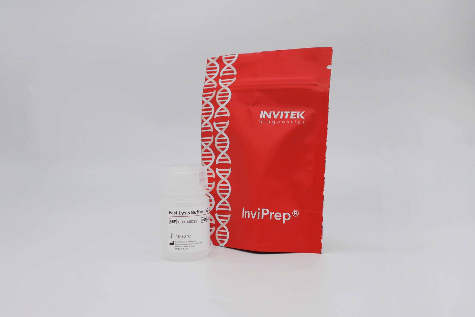 Invitek Diagnostics InviPrep Fast Lysis Buffer bottle in front of the red packaging bag.