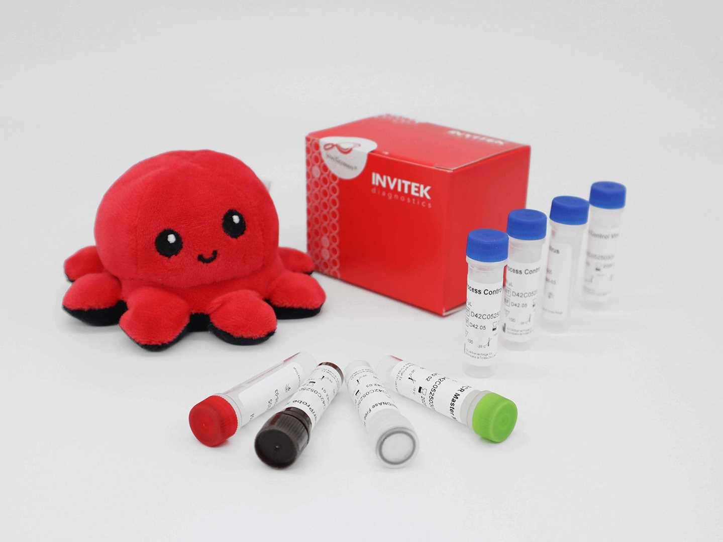 INVITEK InviScreen Hepatitis A kit: red diagnostics box with plush octopus mascot “Invi” behind five upright blue-capped control vials; four reagent vials (red, brown, grey, green caps) lie in front on white surface.