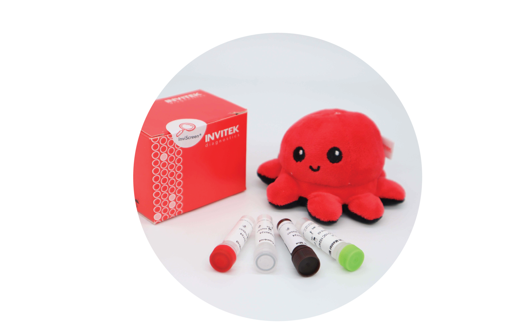InviScreen O157:H7 kit: red box at left, plush octopus to the right, and five reagent vials (red, grey, brown, green and clear caps) spread in front.