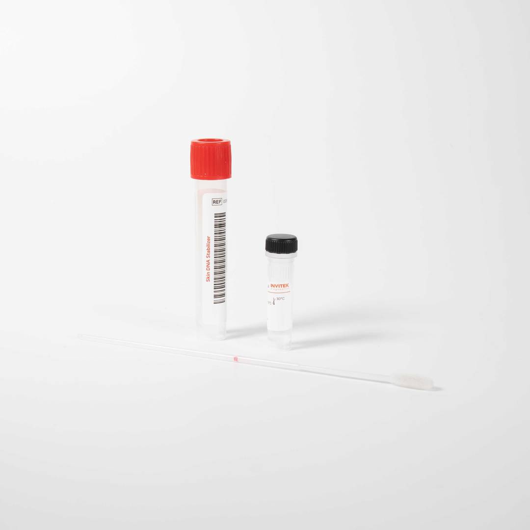 Two small laboratory sample vials on a white background, one larger clear tube with a red cap and barcode label standing upright, and a smaller clear vial with a black cap positioned slightly behind it, both casting soft shadows.
