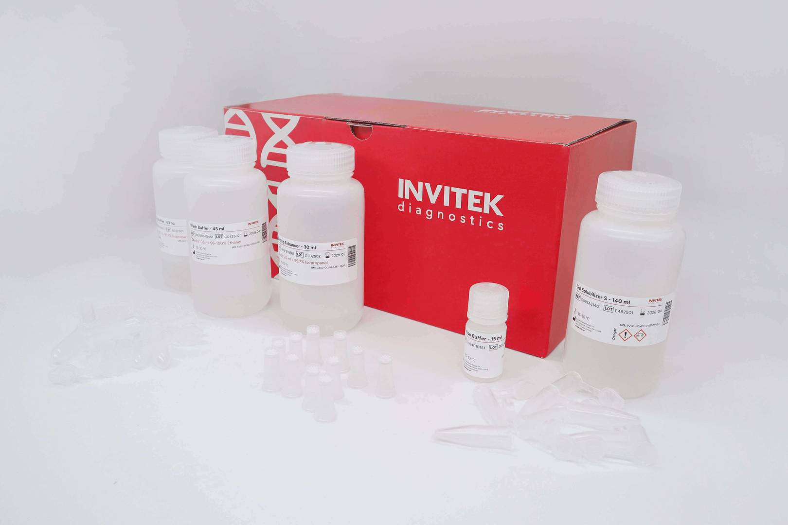 Red Invitek Diagnostics InviSorb Fragment CleanUp box with reagent bottles and spin filters on a lab bench.