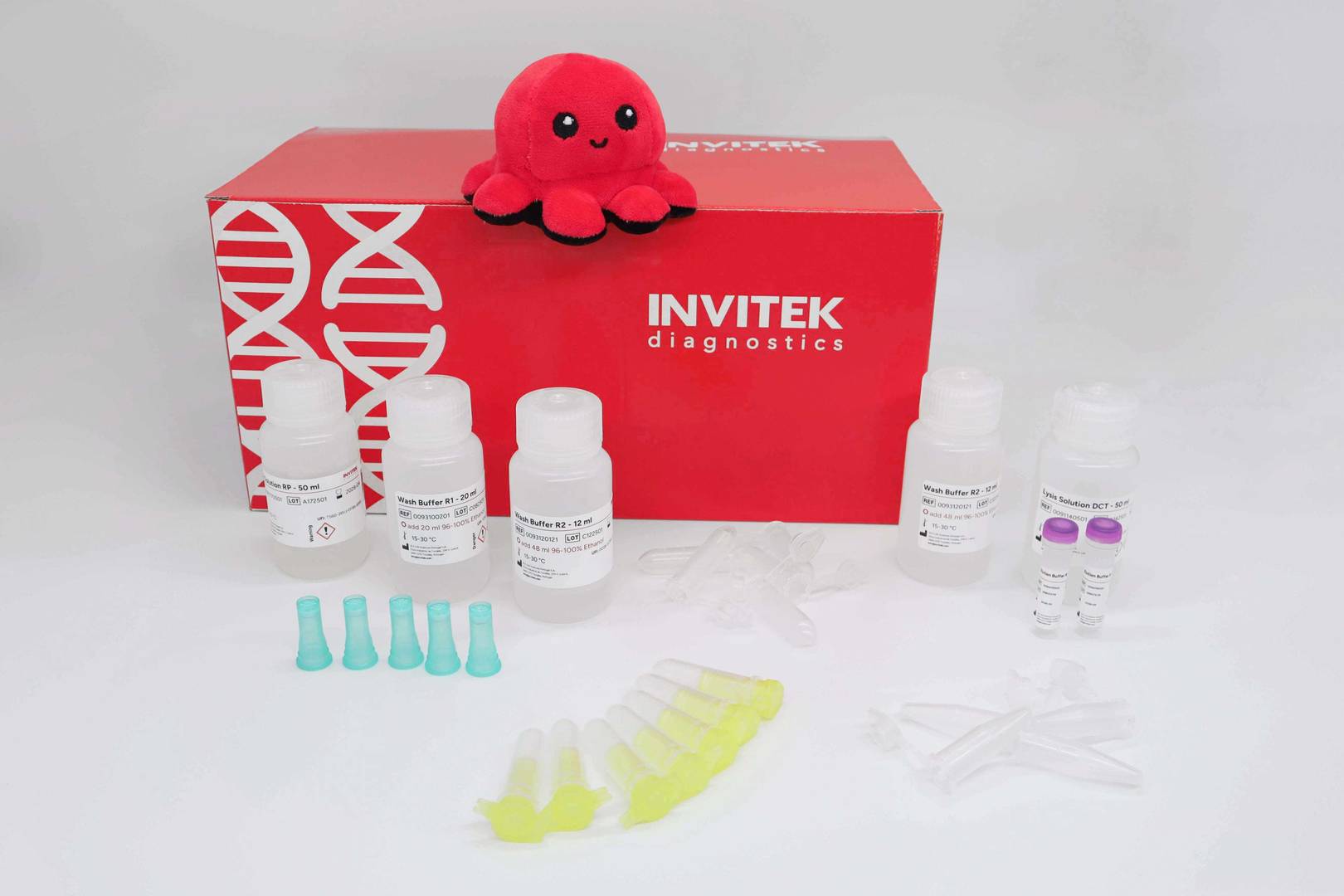 Red Invitek Diagnostics InviTrap Spin Plant RNA Mini Kit box with reagent bottles and yellow spin filters.